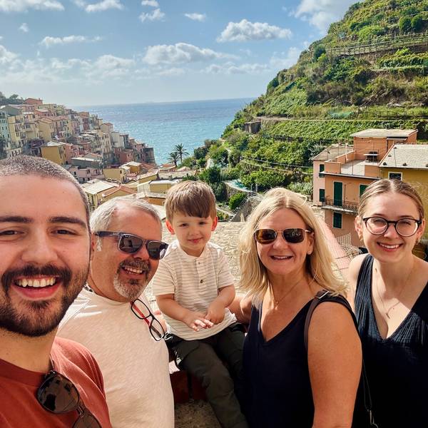 Family walking together on a beach during vacation